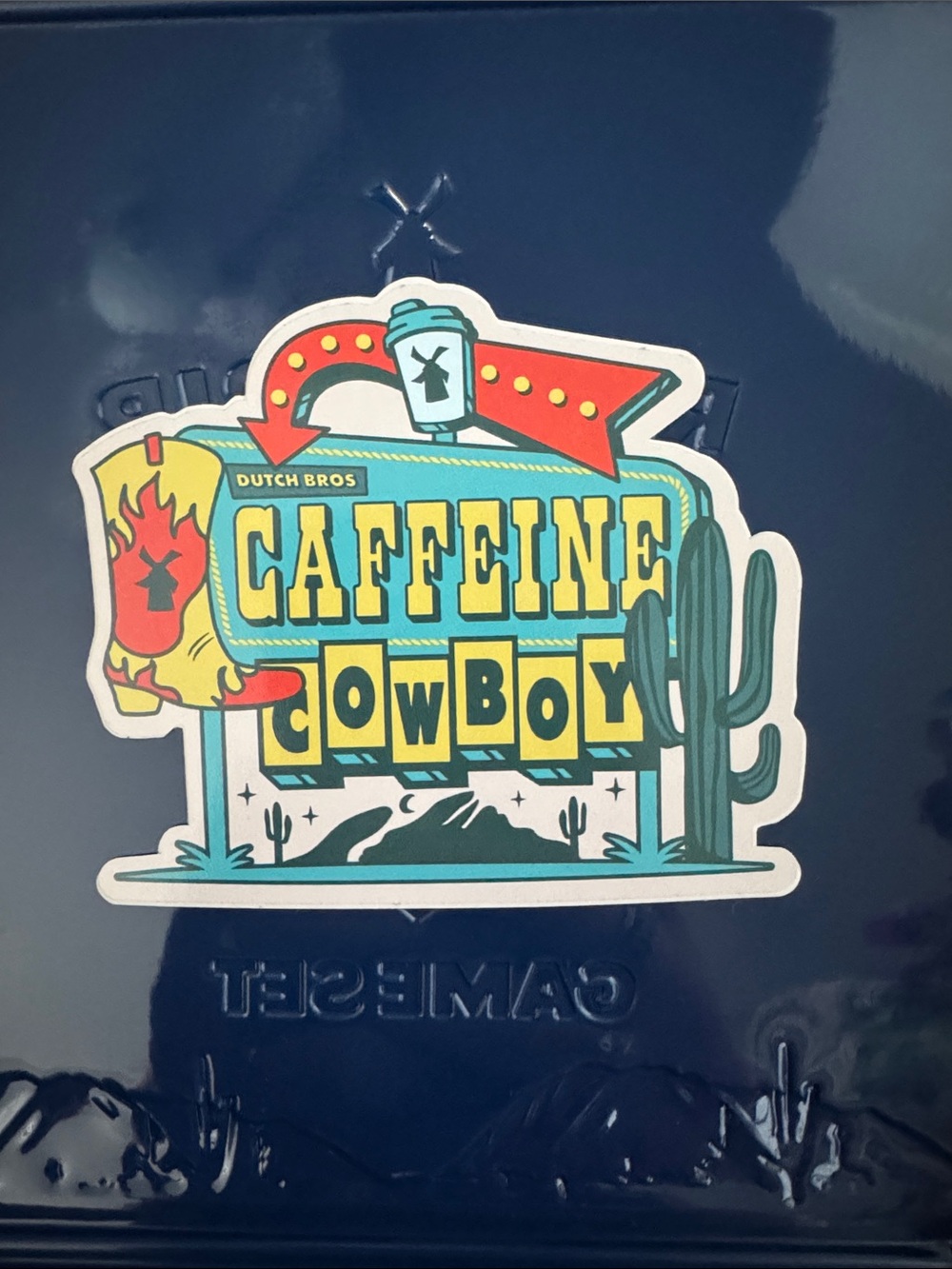 Dutch Bros Caffeine Cowboy Sticker - Teal, Yellow, Red & Green
